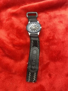 Reloj Timex Vintage Naranja Llama Niños Juventud Visor Fecha Cuarzo Necesita Batería - Imagen 1 de 10