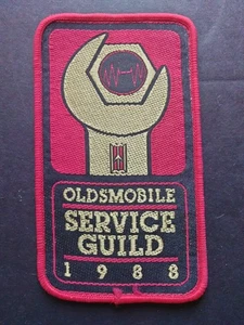 Patch vintage 1988 Oldsmobile Service Guild logo chiave General Motors - Foto 1 di 4
