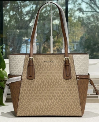 MICHAEL KORS VOYAGER LARGE EW TOTE SHOULDER BAG LAPTOP CAMEL BROWN WHITE MK LOGO - Image 1 of 4