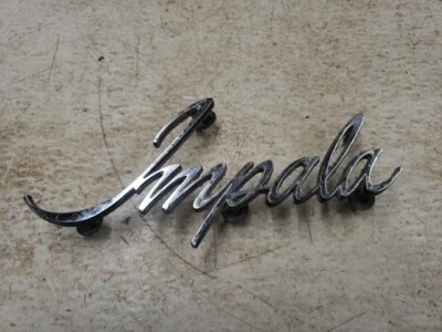 Chevrolet Impala 1969 original guardabarros emblema adorno guión Foto 1 de 4