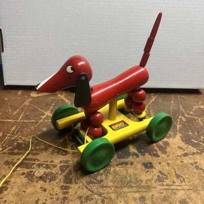Juguete de madera Brio de colección rebotando perro salchicha salchicha rojo Foto 1 de 4