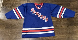 Camiseta deportiva de hockey vintage de los New York Rangers grande azul CCM NHL cosida EE. UU. AÑOS 90 - Imagen 1 de 6