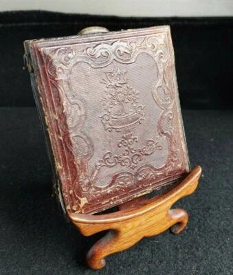 CIVIL WAR ERA DECORATIVE LEATHER POCKET FRAME. W/ LATCHES. W/BABY PICTURE - Image 1 of 4