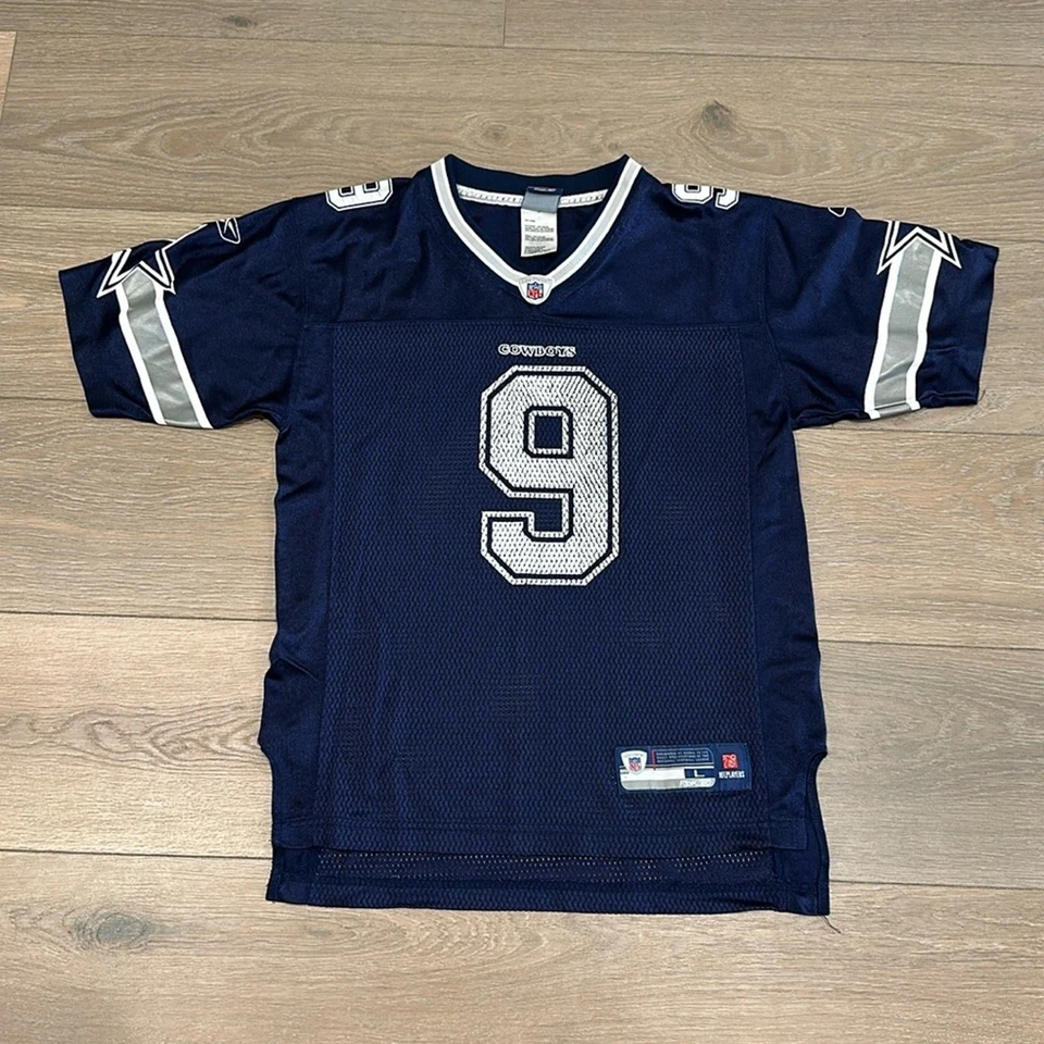Camiseta deportiva REEBOK NFL azul de los Dallas Cowboys cuello en V Romo #9 para niños talla grande Foto 1 de 4
