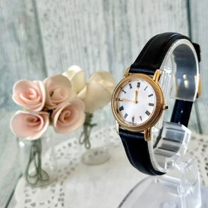 Yves Saint Laurent Uhr Gold und Weiß Gebraucht - Bild 1 von 4