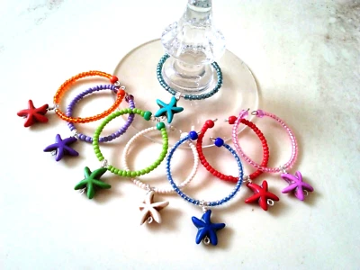 Dijes de copa de vino de piedra de estrella de mar hechos a mano (juego de 8) Foto 1 de 4