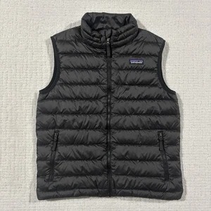Patagonia Daunen gefütterte Weste Jungen Größe Large schwarz durchgehender Reißverschluss outdoory - Bild 1 von 9