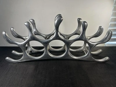 Estante de vino de aluminio fundido de 9 botellas de colección Michael Noll Alemania SPLASH abstracto Foto 1 de 4