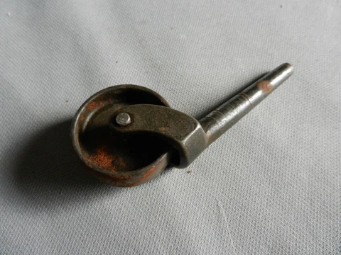 Vintage wheel caster, all steel, 1 1/2 inch diameter, 2 inch post Cover