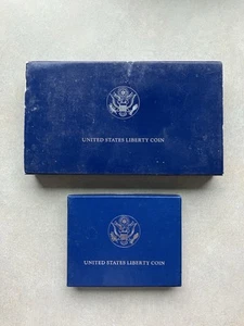 1986 United States Liberty Coins - Silver Dollar And Half Dollar - Picture 1 of 7