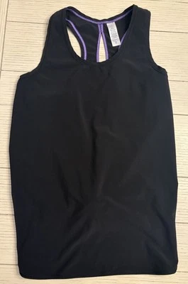 Camiseta sin mangas negra con diseño trasero Ivivva talla 12 usada en excelente estado Foto 1 de 4