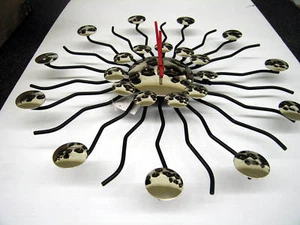  CONTEMPORARY SUNBURST BLACK /CHROME SPIDER-LIKE CLOCK - Picture 1 of 2