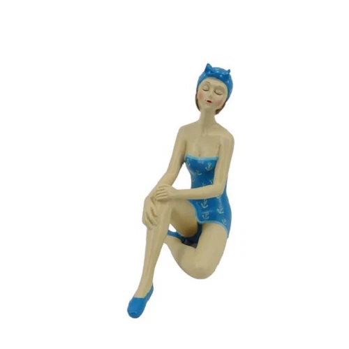 Estatuilla vintage de belleza de baño relajante en la playa - azul y blanco Foto 1 de 1