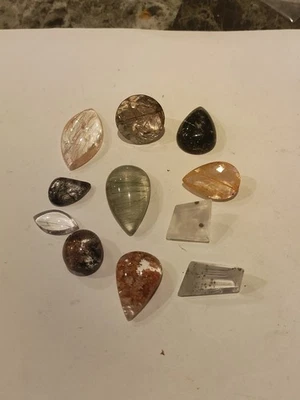  Lote 325cts de cuarzo rutilado y terminado facetado y cabujón AAA+++ Foto 1 de 4