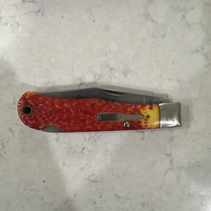 REMINGTON USA DELRIN JUMBO BULLET TRAPPER KNIFE 2004 R1303 LOCKBACK Red Yellow - Picture 1 of 6