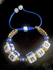 Pulsera Estilo Shamballa Inspirada en Divine Nine SGRHO - Estilo Azul/Dorado 2-0246 - Imagen 1 de 6