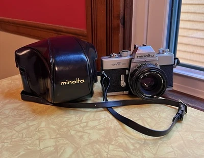 Cámara fotográfica Minolta SRT 101 SLR 35 mm con lente Minolta MD 50 mm 1,7 + estuche y correa Foto 1 de 4