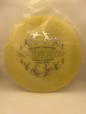 INNOVA DISC GOLF 2004 USDGC GLOW ROC CLIMO SCHULTZ 03 BATTLE "ONE HEROIC BATTLE" - Image 1 of 4