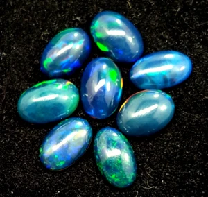 Lotto pietre preziose cabochon fuoco ovale opale etiope nero 100% naturale 14,90 ct - Foto 1 di 4
