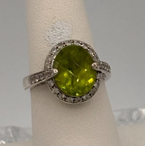 Paul Deasy's ss/rhodium oval peridot and white sapphire women's ring size 8 - Image 1 of 4