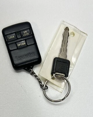 Original Chevrolet GMC CHEVY GM 96 Safari OEM KEY LESS Entry Remote FOB and Key - Image 1 of 4