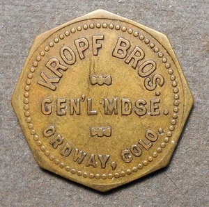 Ordway, Colo., Kropf Bros., Gen’l Mdse.   Bueno para 25c en mercancía. Latón, o - Imagen 1 de 2