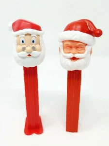 2 Santa Claus Pez Dispensers 1 VTG No Feet 1976 +1 2012 w/Feet Holiday Dispenser - Picture 1 of 12
