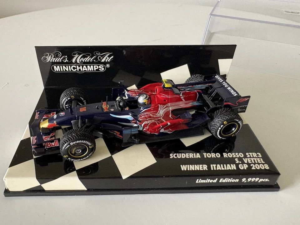 Minichamps 1/43 Seb Vettel 2008 Italian GP First Win Toro Rosso - Image 1 of 4