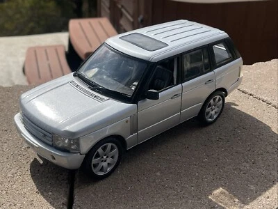 2002 Land Rover LR04 RR cinza por ERTL escala 1:18 fundido - Imagem 1 de 4