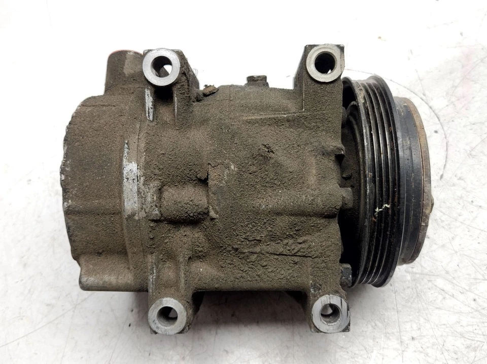 Compresor de aire acondicionado Nissan Pathfinder 2001-2004 OEM 926004W000 Foto 1 de 4