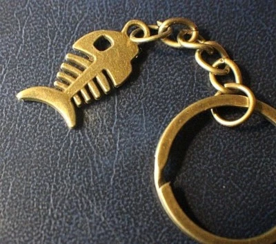 РЫБНЫЕ КОСТИ Lil гольян бронзового цвета брелок рыболовства легкий подарок  - Изображение 1 из 4