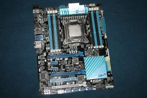 Carte mère Asus P9X79 socket 2011 quad DDR3 PCI-E Core i7 3820k - Photo 1/8