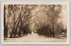 Kingman, Kansas (KS) RPPC Postcard: Avenue C, (West?) - Picture 1 of 2