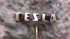 Vintage Tesla Electronics Firm Capital Letter Gold Logo Equipment Pin Badge - Picture 1 of 3