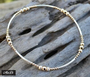 Pulsera elástica hecha a mano con relleno de oro amarillo 14K y plata esterlina. - Imagen 1 de 4