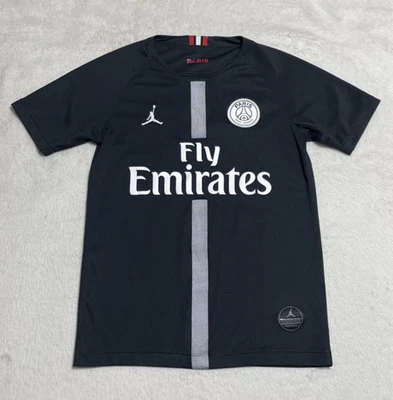 Camiseta deportiva Paris Saint Germain 2018 19 Air Jordan para niños negra manga corta mediana PSG Foto 1 de 4
