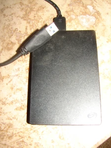 Seagate Expansion Portable 2TB External Hard Drive - Afbeelding 1 van 1
