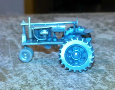 1/43 unbranded farmall F-20 pewter tractor in nice shape used - Image 1 of 4