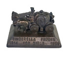 1939 Cinderella Frocks for Girls 25th Anniversary Metal Paperweight Carriage