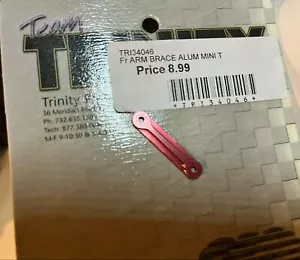 Trinity TRI34046 Supporto perno cerniera braccio anteriore alluminio rosso per Mini-T 1.0 Baja Slider RC - Foto 1 di 2