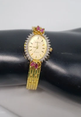 Vintage Geneve Quartz Thailand Movement Gold Womens Oval Watch Rubies Hong Kong - Image 1 of 4