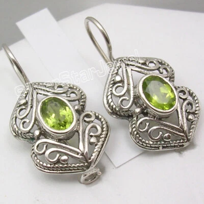 TOP BEST TRENDING DEALS 925 Silver GREEN PERIDOT 2.0 tcw Hook Earrings 1 1/8" - Image 1 of 3