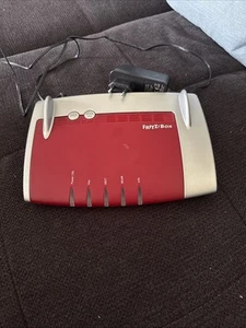 FRITZ Box 7430 WLAN-Router mit Modem - Rot/Weiß (20002798) Edition Mnet - Bild 1 von 2