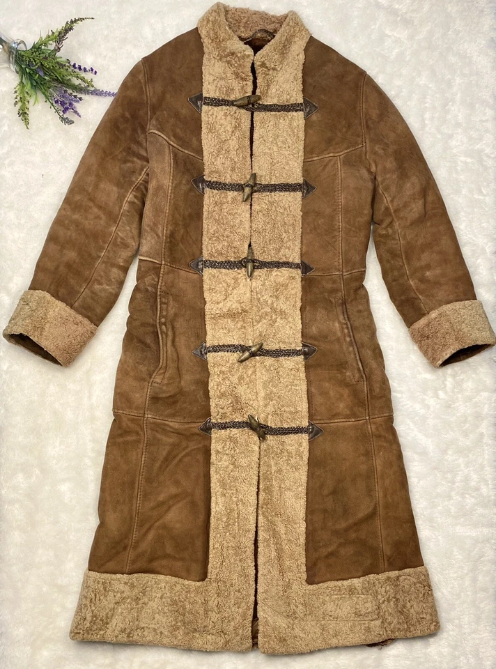 Abrigo de cuero forrado de piel vintage con rizado de cordero trampero boho cálido hecho a mano Foto 1 de 4