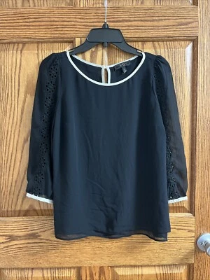 Top Jessica Simpson para mujer talla S negro mangas largas bordados ojales forrados Foto 1 de 4