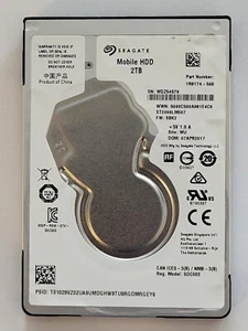 ST2000LM007, PN: 1R8174-568, SN: WDZ54579, WU,FW: SBK2, Seagate 2Tb 2.5" HDD - Imagen 1 de 2