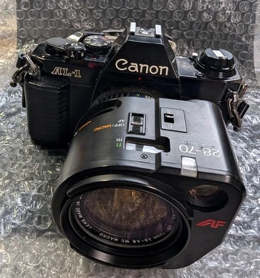 Cámara SLR Junk Canon AL-1 con lente de 28-70 mm equipada con enfoque automático Foto 1 de 4