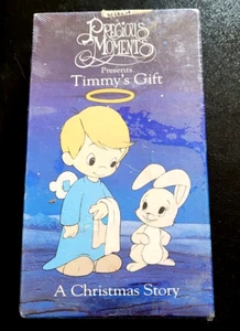 VHS DE VACANCES POUR ENFANTS PRECIOUS MOMENTS « cadeau de Timmy ; histoire de Noël » 1991 ; NEUF - Photo 1/13