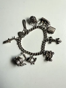 VINTAGE FINE SILVER CHARM BRACELET. 9 CHARMS. SHARK, RACING CAR. 49.9 GRAMS - Picture 1 of 6