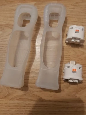 2x Official Nintendo Wii Motion Plus Adapters white  + Official Silicone Sleeves - Image 1 of 4